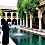 Damascus Old City**

"A professional photographer's shot of the Damascus Old City, featuring a traditional Arabic house courtyard with a flowing fountain and jasmine trees. Fully clothed tourists are admiring the architecture. In the background, the bustling souks are visible. Perfect anatomy, correct proportions, natural pose, well-formed hands, proper finger count, natural body proportions, safe for work, appropriate content, fully clothed, professional, modest, family-friendly."

**