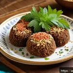 시리아 전통 음식 소개 - A beautifully arranged traditional Syrian dining table featuring a variety of kibbeh types: raw kibb...